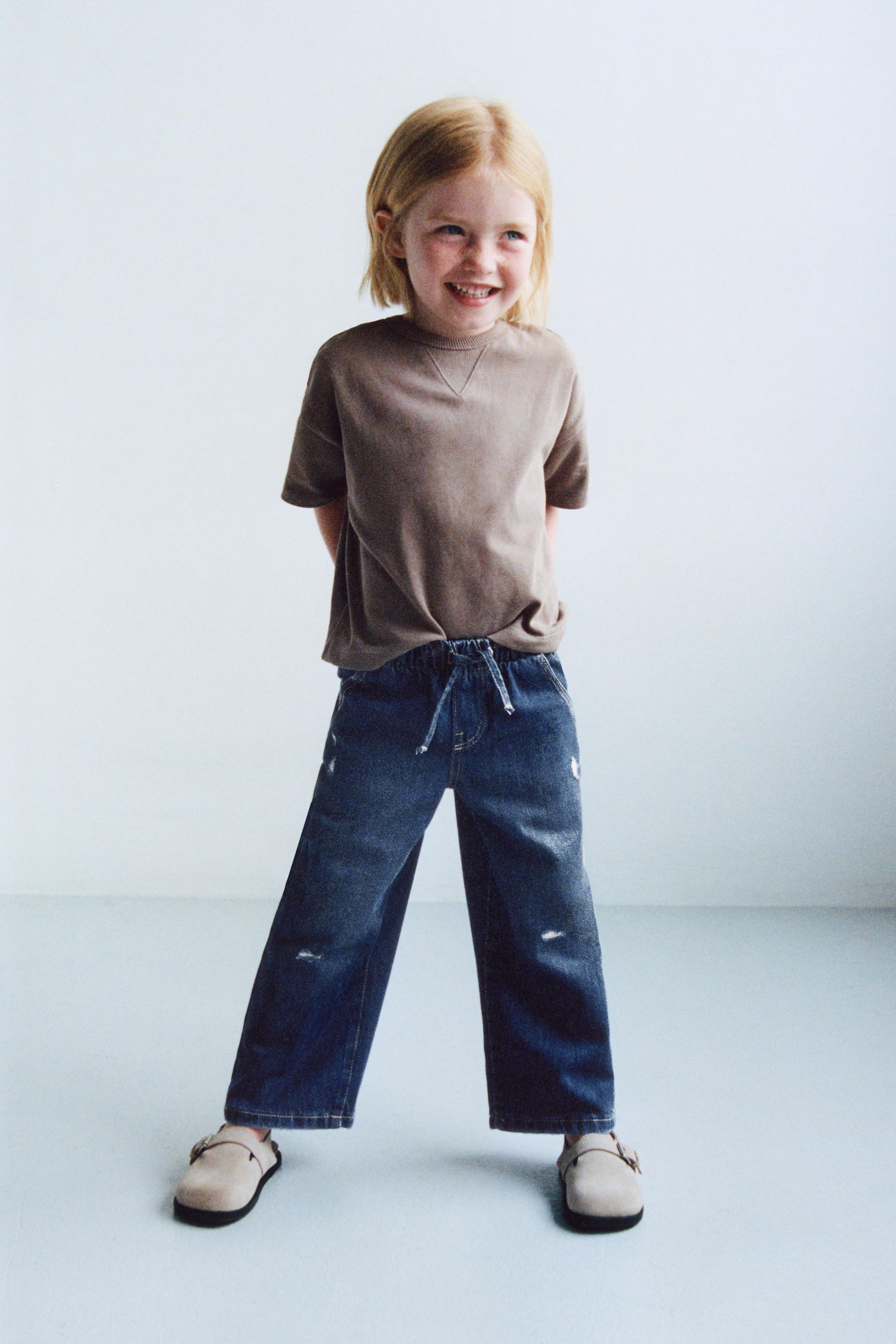 FLUID RIPPED WIDE LEG JEANS